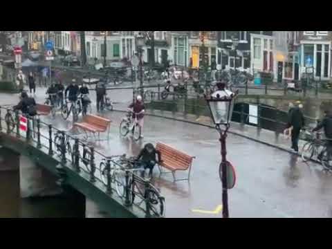 slippery ice bridge in amsterdam impossible to cross "its just one more clip"