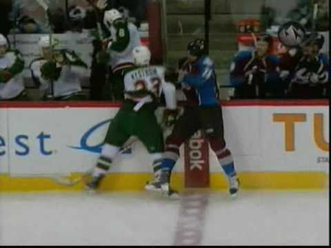 David Koci CRUSHES Eric Nystrom into the stanchion
