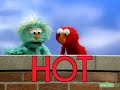 Classic Sesame Street Elmo And Rosita Spells HOT