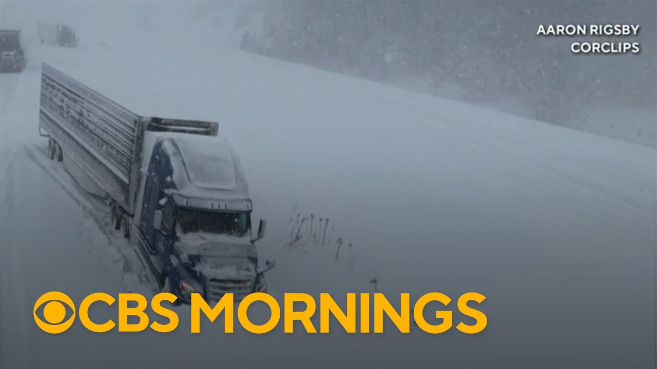 Late winter blizzard slams upper Midwest while possible tornado tears through South