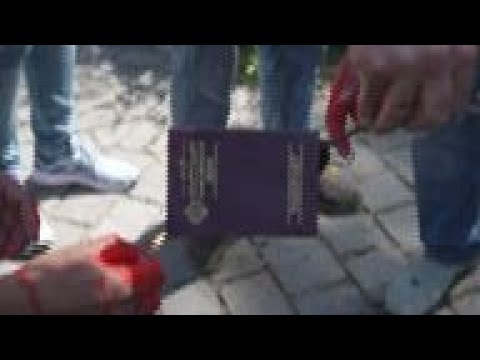 Iranians burn passports outside Santiago embassy
