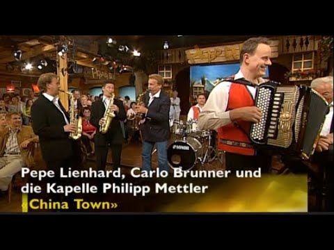 "CHINA-TOWN" von PHILIPP METTLER mit CARLO BRUNNER / PEPE LIENHARD und der Kapelle Philipp