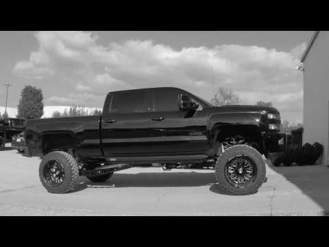 Chevy 2500HD High Country McGaughys 9\" Lift Specialty Forged SF009 w/ Toyo M/T