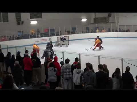 Jake Schmelzer, #22 yellow Calvert Hall, with a power play shift vs. Mt. St. Joseph Jan. 2022.