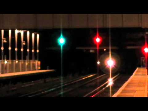 DRS 37612 & 20309 pass Kensington Olympia on 6M95 11/01/2012