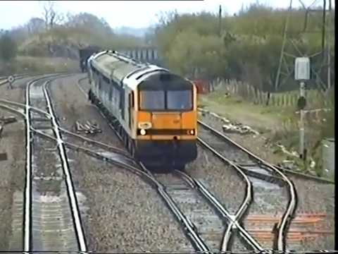 Rare combination a Class 60 & Class 37 on a Railtour Heading down Stormy Down Bank South Wales.
