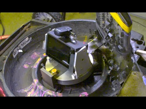 Guy Attaches A High-Speed Camera To A Lawnmower Blade, Films It Destroying Stuff