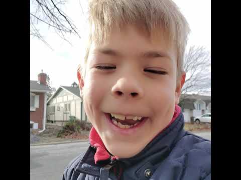 helping my dad hang up Christmas lights