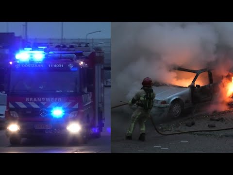Brandweer Oostzaan met Spoed naar een voertuigbrand in Zaandam bij sportpark Poelenburg