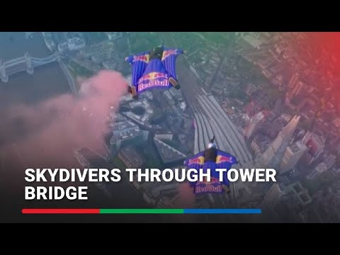 Skydivers fly through London's Tower Bridge ABS-CBN News