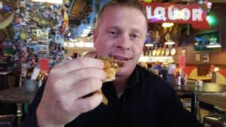 Jason eats a Hellfire Slider at Roosters