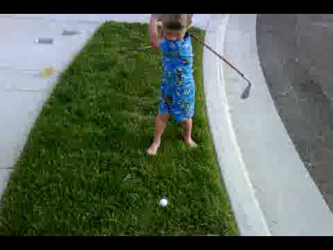 Carson practicing with his new TaylorMade Burner clubs