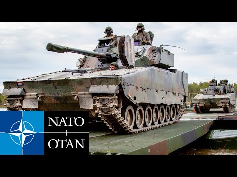 NATO. Powerful tanks and combat vehicles during an Alliance exercise in Norway.