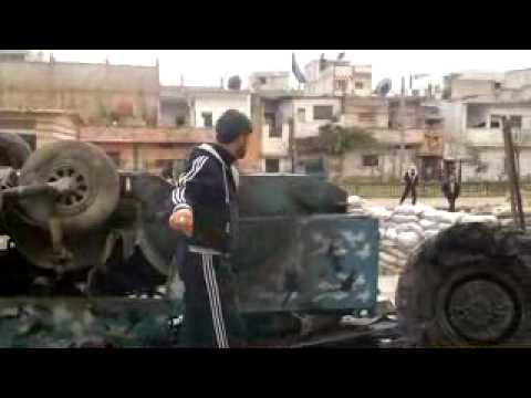 كتيبة معاذ بن جبل تقوم بقص مصفحة والاستفادة منها في مدينة حمص