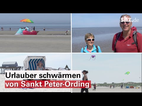 "Fast wie in Kroatien": Urlauber in Sankt Peter-Ording genießen das Sommerwetter