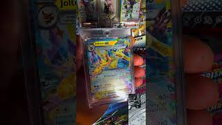Double Rare Tera card! crystal crown artwork looks insane in hand #pokemon #shorts #jolteon