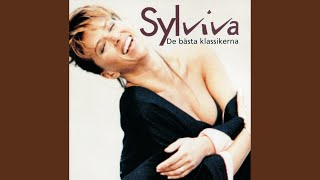 Kadr z teledysku Y viva Espana (In Swedish) tekst piosenki Sylvia Vrethammar