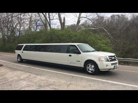 SUV Limos in a row driving past