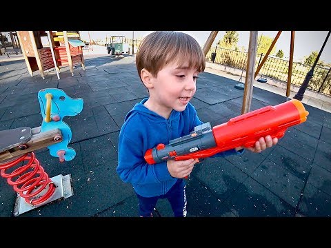 NERF IN THE OUTDOOR PLAYGROUND WITH TOYS FOR KIDS!! Brancoala and Marcos