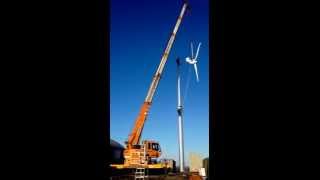 preview picture of video 'Waterford Crane Hire (Ireland) - Kato MR220sp erecting 20 meter high Wind Turbine'