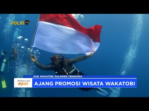 POLRES WAKATOBI KIBARKAN BENDERA MERAH PUTIH DI BAWAH LAUT