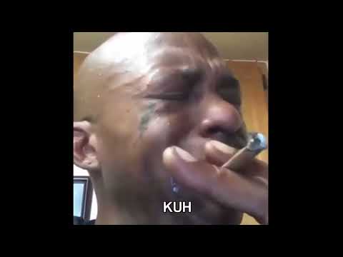 Smoking and crying black guy