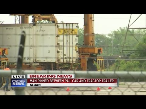 Man Pinned Between Rail Car and Tractor Trailer In Sloan, New York