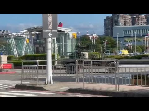 Military vehicles seen deployed in Taipei as China military encircles Taiwan in drills | AFP