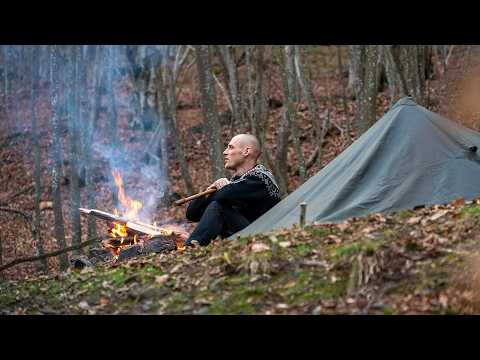 Solo bushcraft trip - bear territory, cold lake swim, canvas shelter, homemade axe, campfire cooking