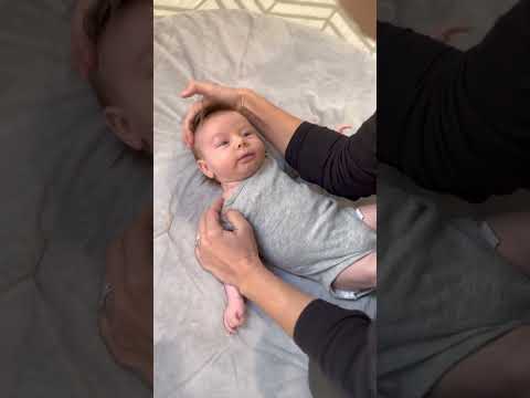 Left lateral tilt stretch for torticollis - Fit Family Littles - Pediatric Physical Therapy