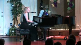 "Facing a Task Unfinished"  sung by Jessica Raspolich