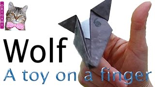 Origami wolf. A toy on a finger. Origami for children
