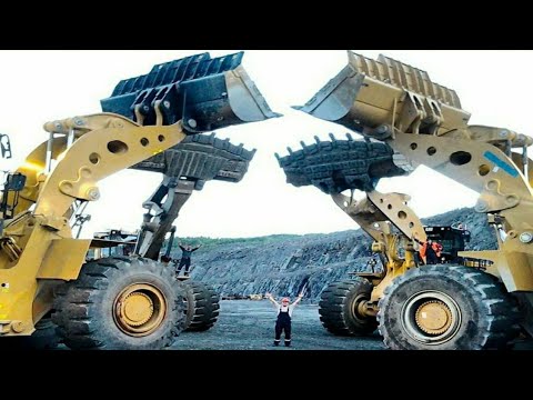 Caterpillar 6015B And Liebherr 984 Excavators Loading Dumpers.