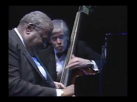 [HQ] Oscar Peterson Quartet feat. Joe Pass - Nigerian Market Place (1987)