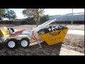 superior loading of a mini skip by a skipgo agent. manufactured by skiprent. www.skiprent.co.za