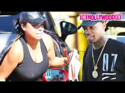 Heather Sanders & King Trell Pull Up With Chic-Fil-A In A Red Ferrari At The Sorella Boutique In LA