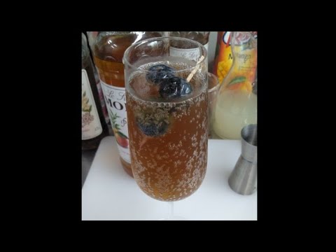 Peach Bellini.  fizzi summer time drink.  mocktail recipe..