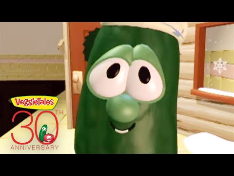 Close-up of Larry the Cucumber from VeggieTales peeking through a doorway with a warm kitchen set in the background and a VeggieTales 30th Anniversary logo in the corner.
