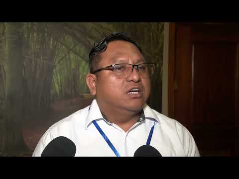 How do Villages Become Towns in Belize?