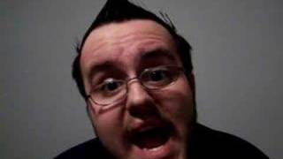 The brilliance here is that while he might very well be in on the joke, his super-magnified eyeglasses lenses may not.