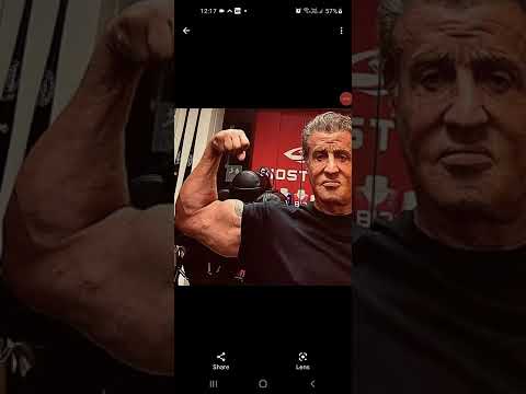 Stallone in Gym after workout biceps flex