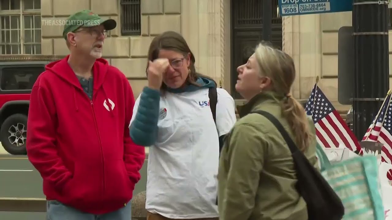 USAID workers pay mournful final visit to agency to clear out their belongings under federal guard