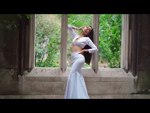 Video Portrait of Pariz Montecarlo wearing White Dress