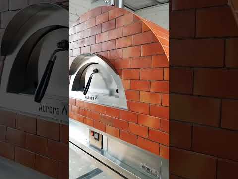 Pizza ovens with custom decoration blue and terracotta