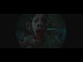 Evil Dead Rise 2023 While Danny And Beth Are Distracted Rescuing Kassie And Locking Ellie Out