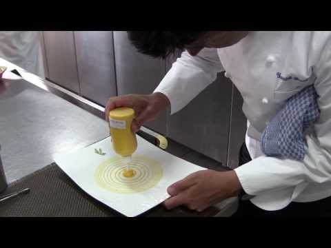 Franques prepares a lobster dish by using a disc jockey turntable