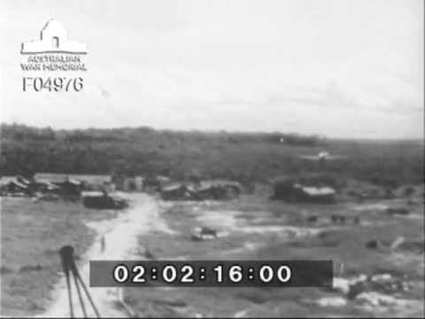 Spitfire in flight and gun camera film of strafing attacks