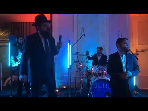 Watch Mendy Brull And Benny Freidman Performing נפשי Together With The Blue Melodey Band.