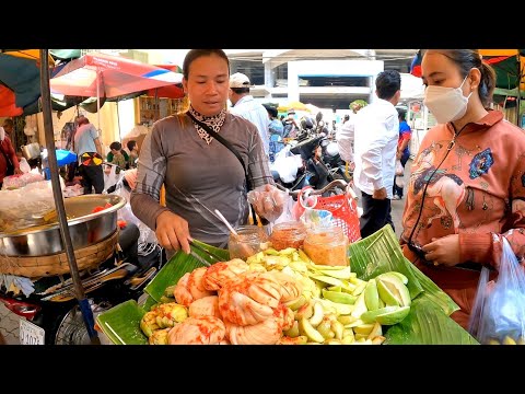 Famous Cambodian market street food, walking tour Phnom Penh traditional market at Boeng Trabaek