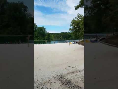 The beach was surprisingly clean with white sand.  Nearby was the nature trail, a playground, and paddling area.